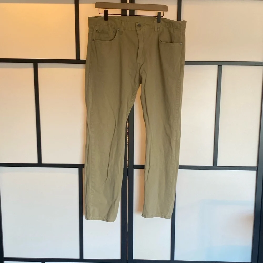 Levi's 502 tan pants. Size 36. HEMMED‎
